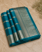 Teal Banarasi Georgette Saree with Silver Jaal Zari Border