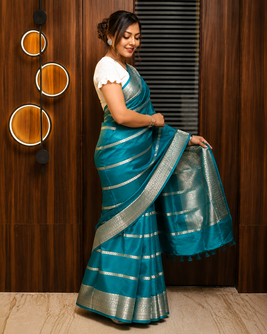 Teal Banarasi Georgette Saree with Silver Jaal Zari Border