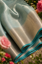 Powder Blue Tissue Silk Saree with Gold Herringbone Border