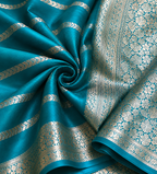 Teal Banarasi Georgette Saree with Silver Jaal Zari Border