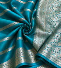 Teal Banarasi Georgette Saree with Silver Jaal Zari Border